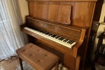 Kawai upright with wheels piano