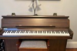 Old small upright piano