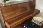 Unsure, upright piano