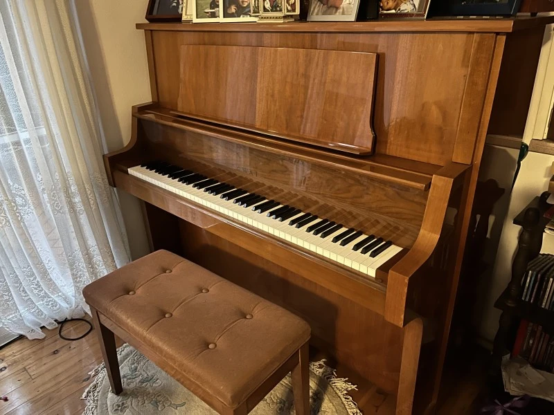 Kawai upright with wheels piano