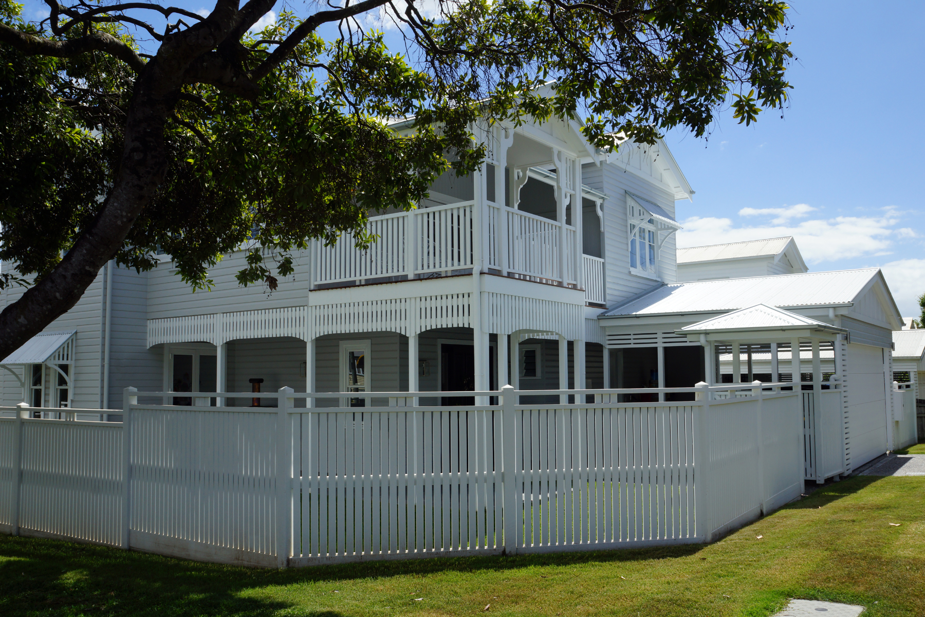 White painted, picturesque queenslander timber home