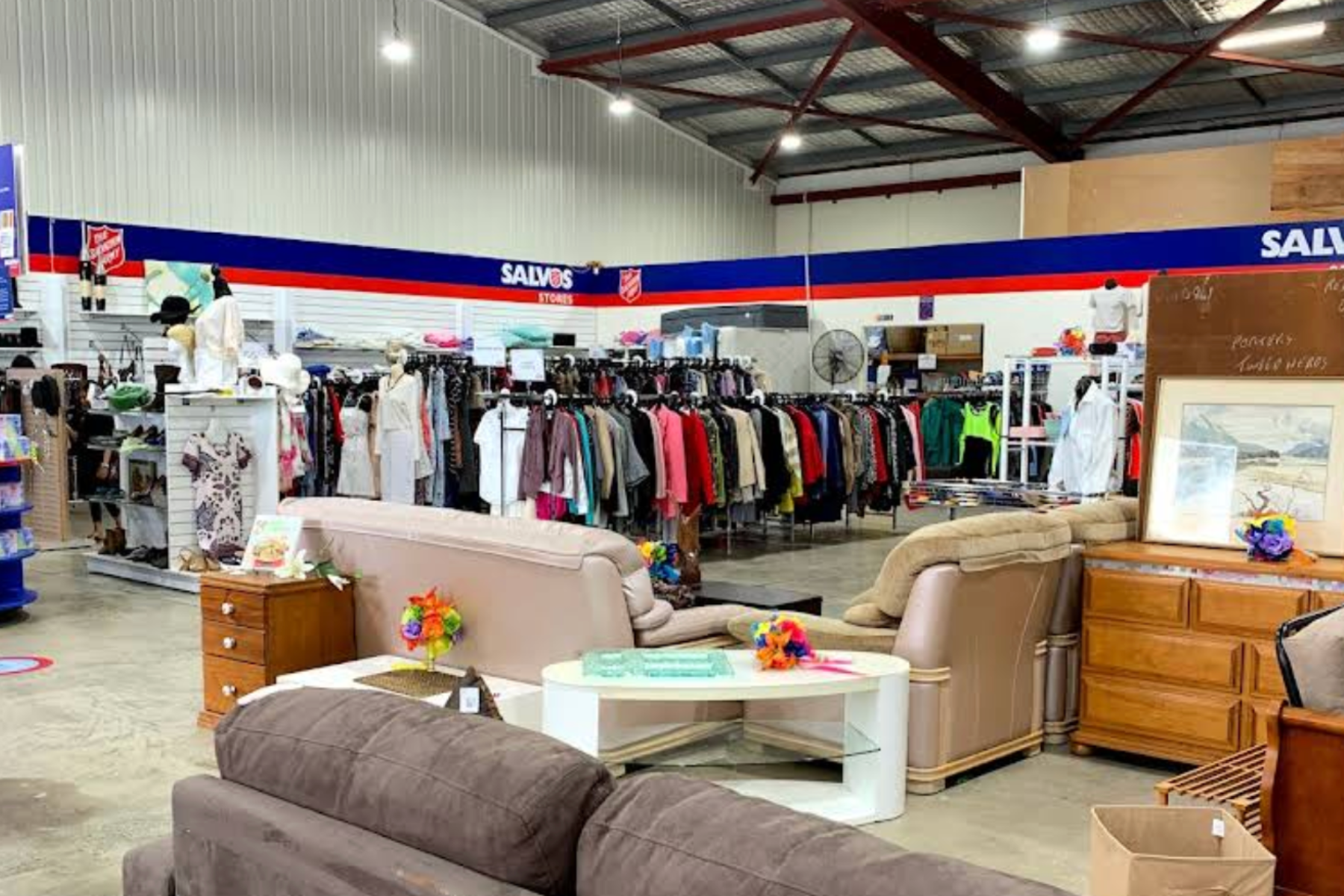 second hand store with clothes and furniture