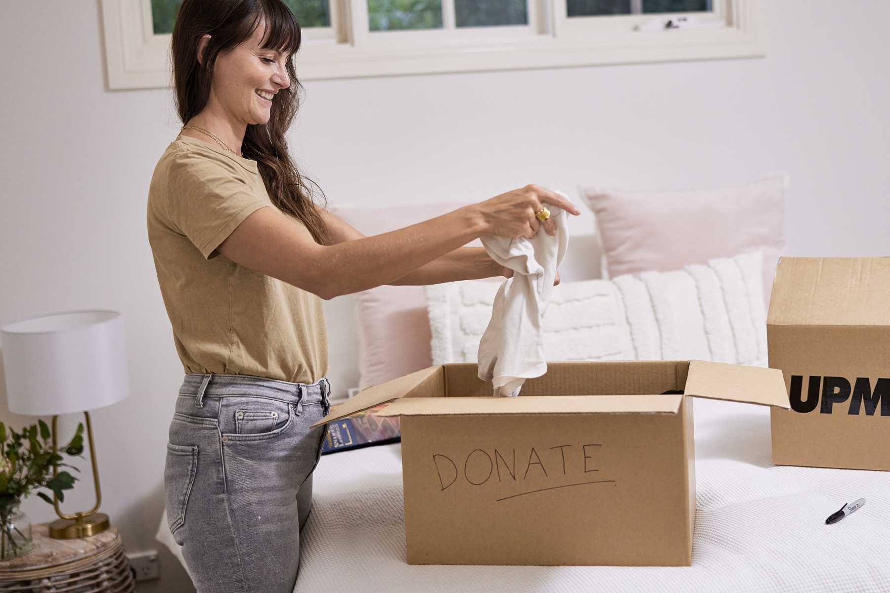 woman decluttering