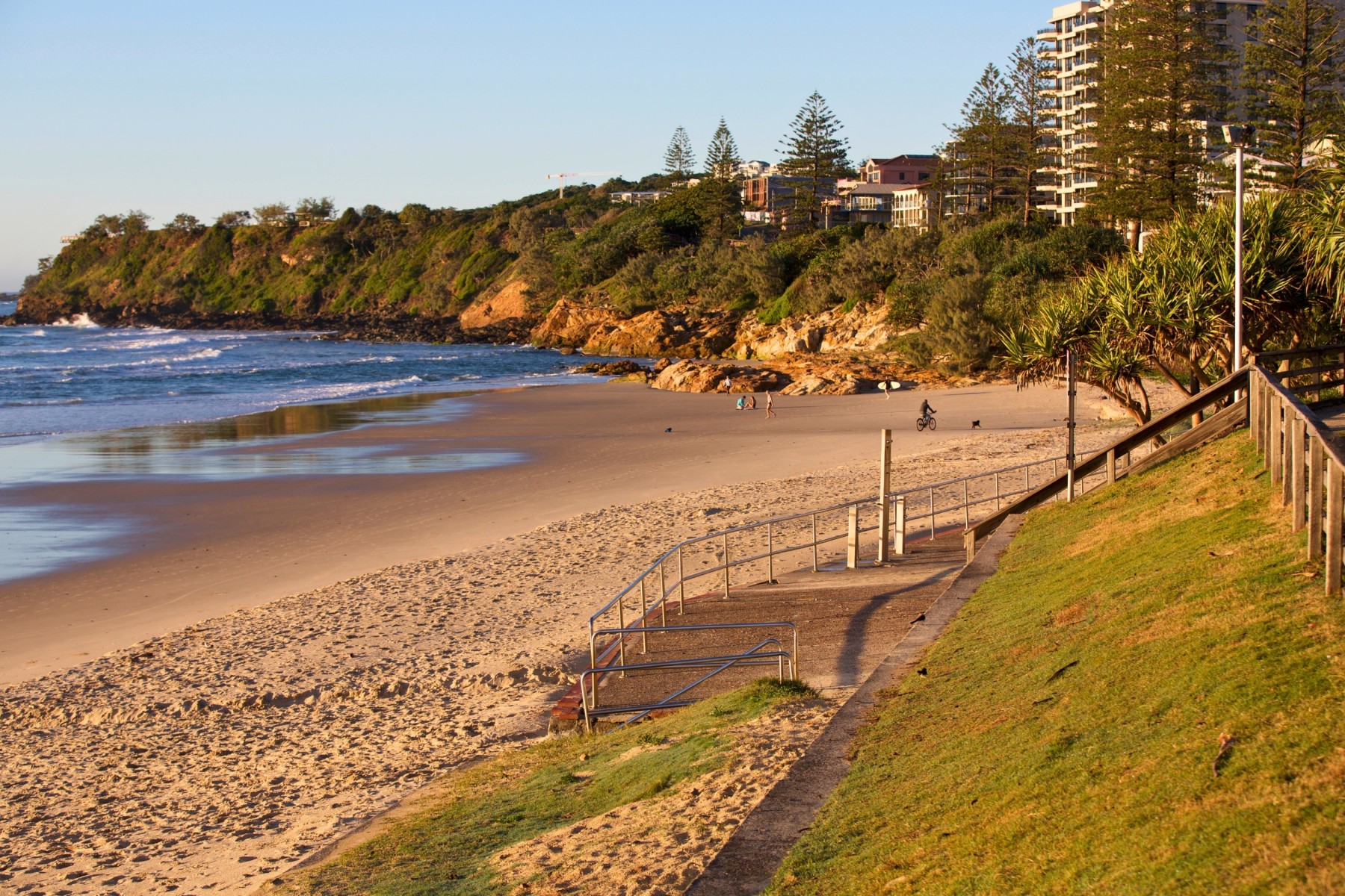 People enjoying early morning beach on the Sunshine Coast