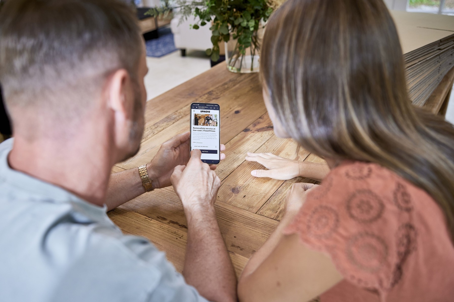 couple looking at smartphone