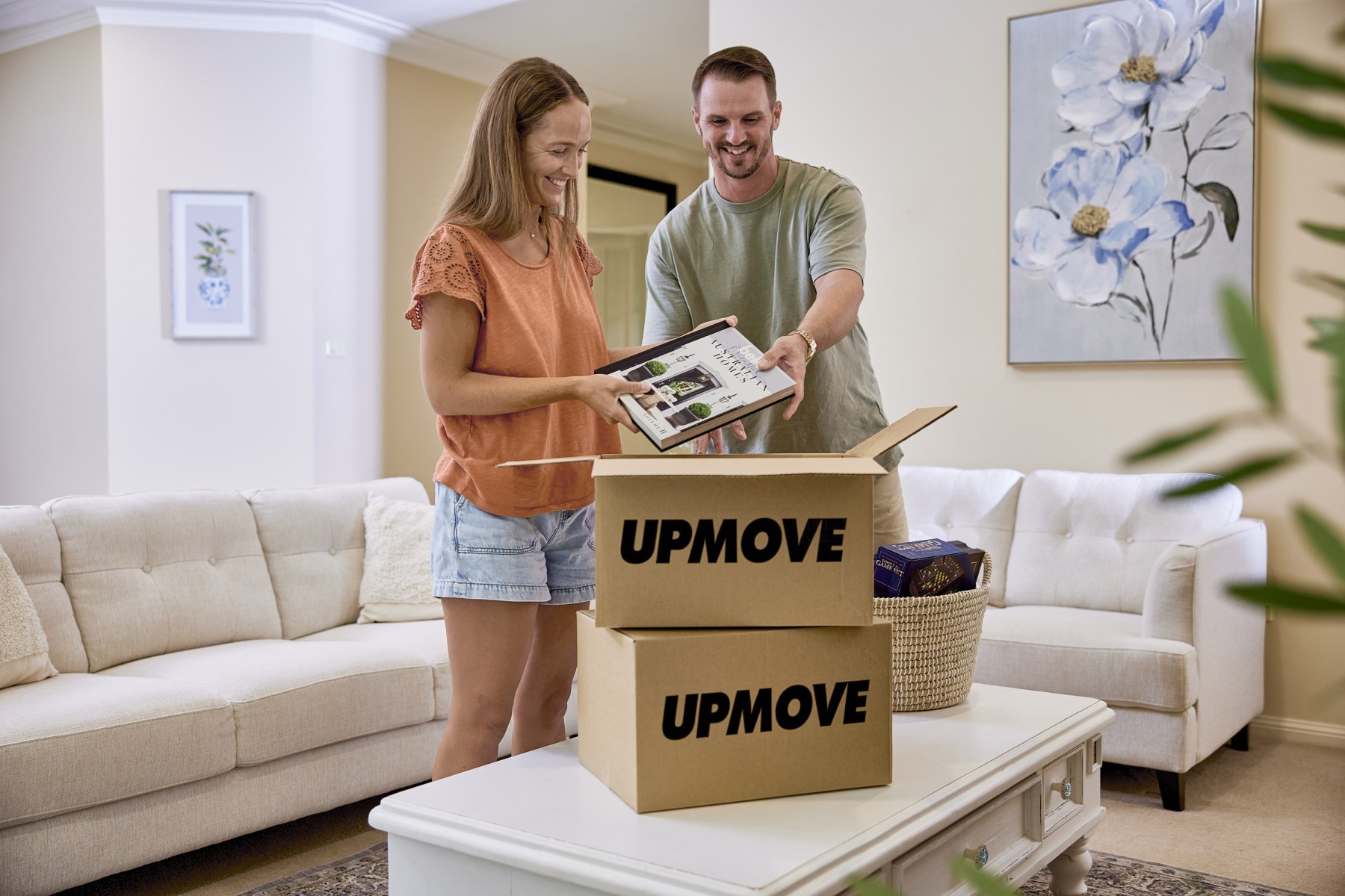 Couple packing and getting ready to move for work in Australia