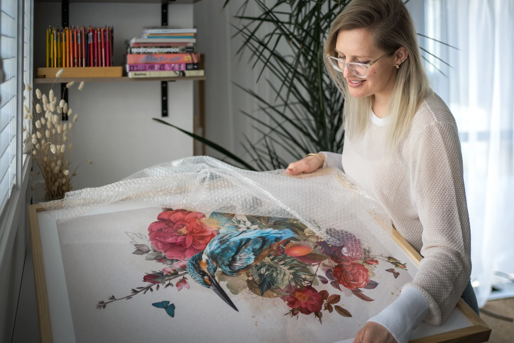 woman with artwork and bubblewrap