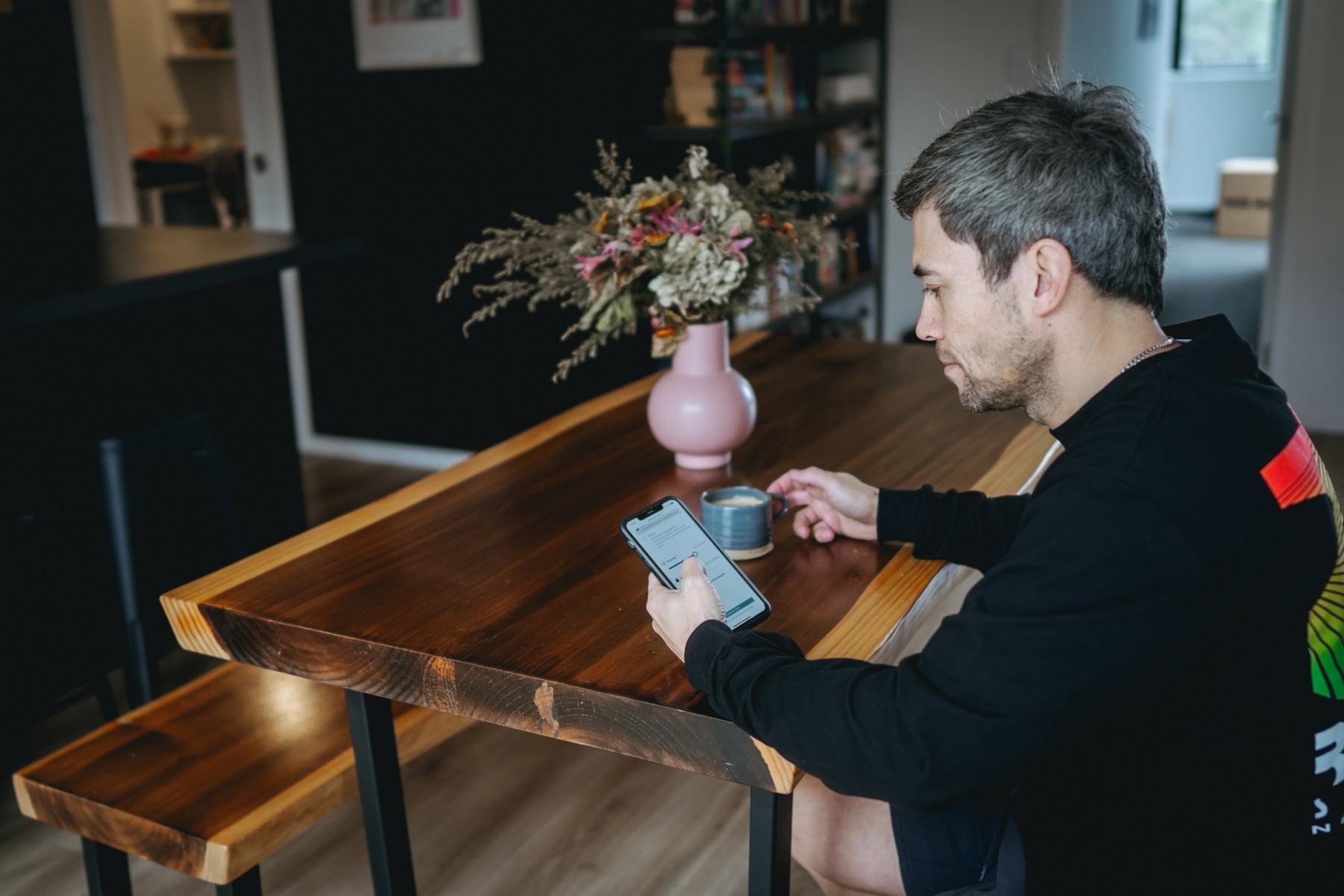 homeowner looking at phone