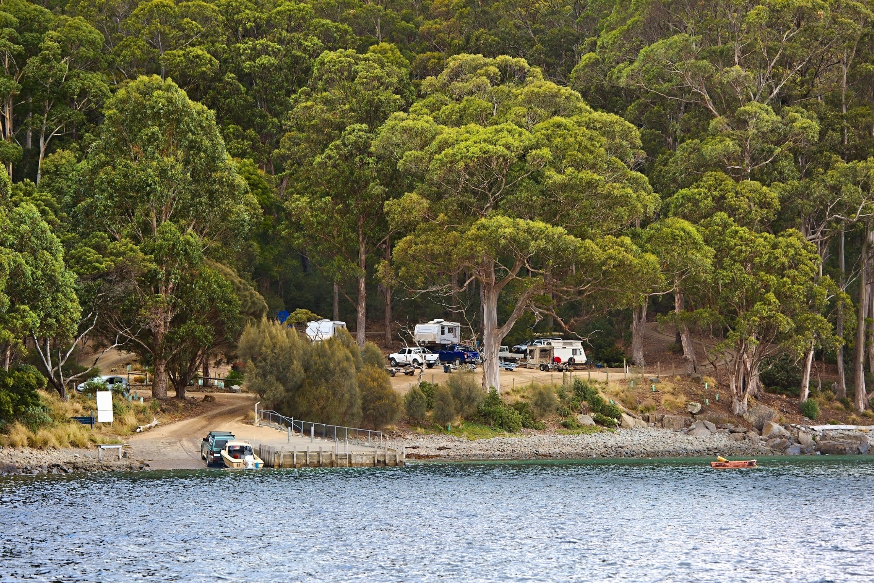 Campers at shore in Fortescue Bay, Tasman National Park