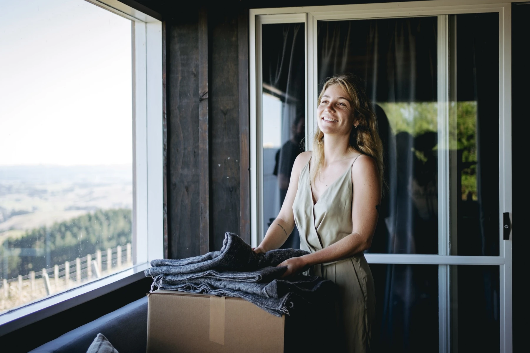 woman packing a room