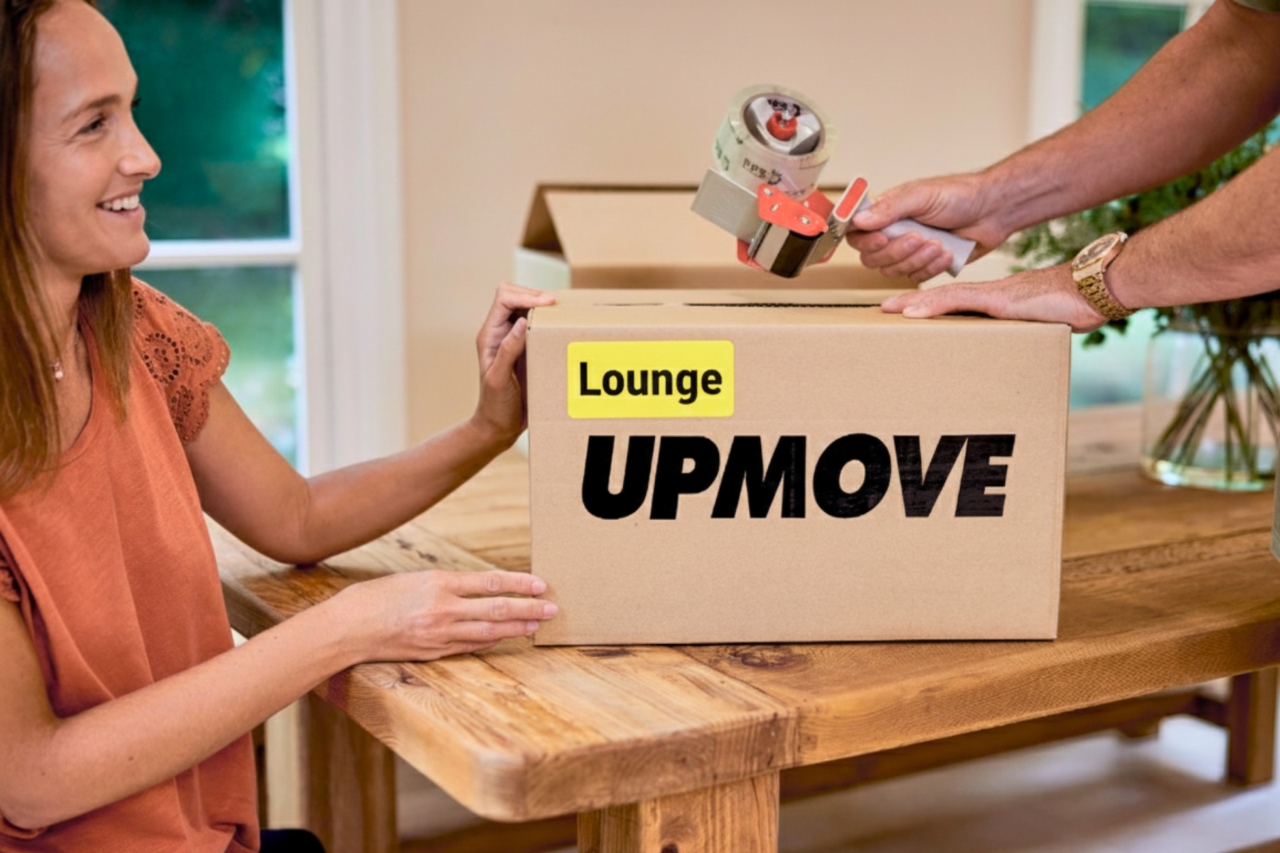 Couple colour-coding their lounge packing boxes with yellow sticker