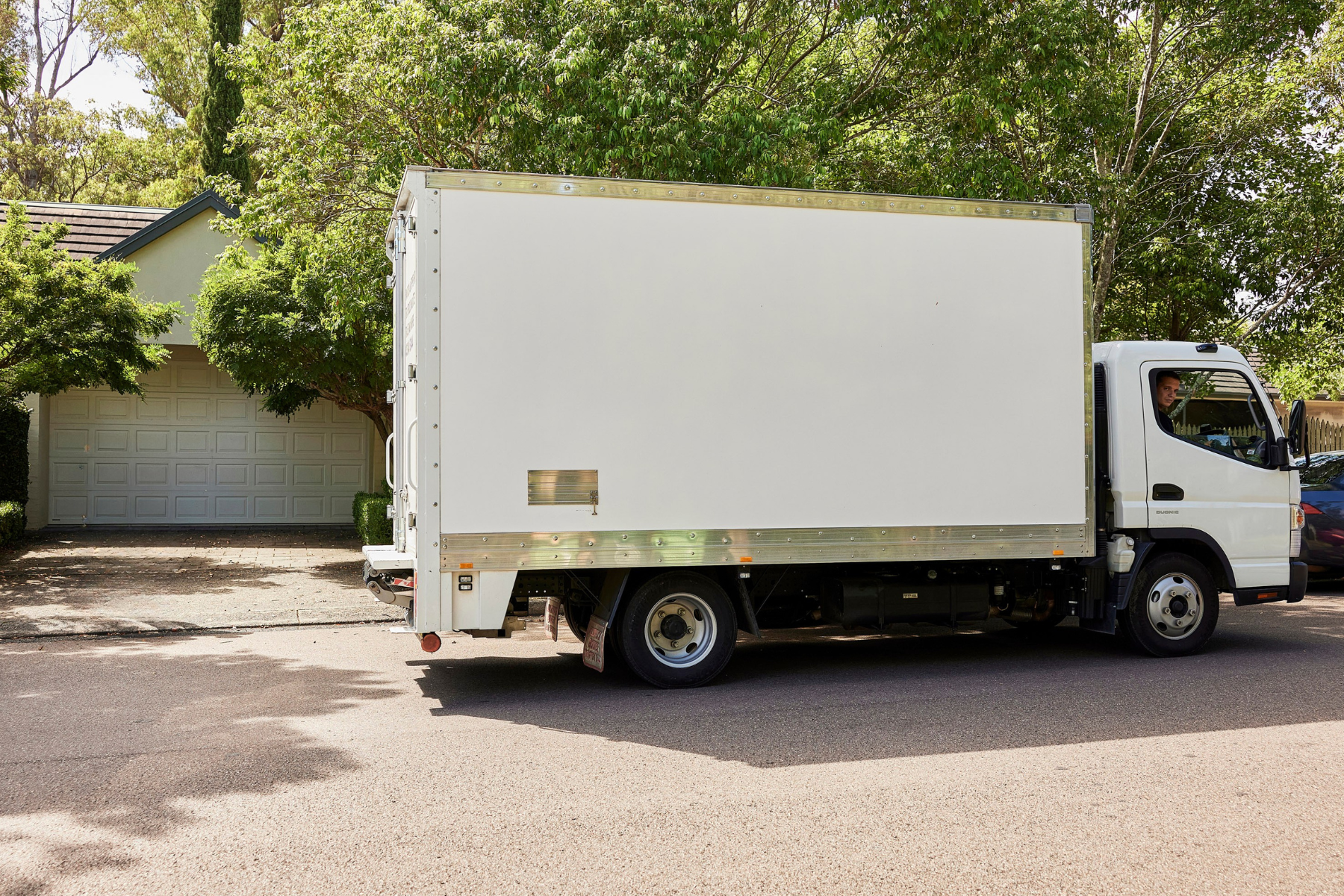 removalist truck in front of house