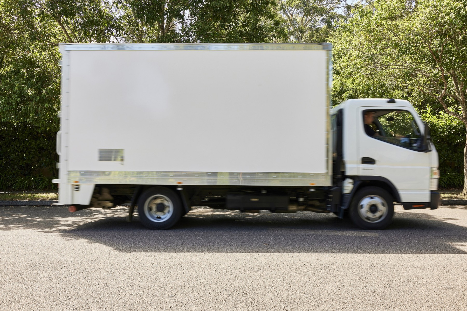 Upmove hired truck driving on road for interstate Sydney to Brisbane move