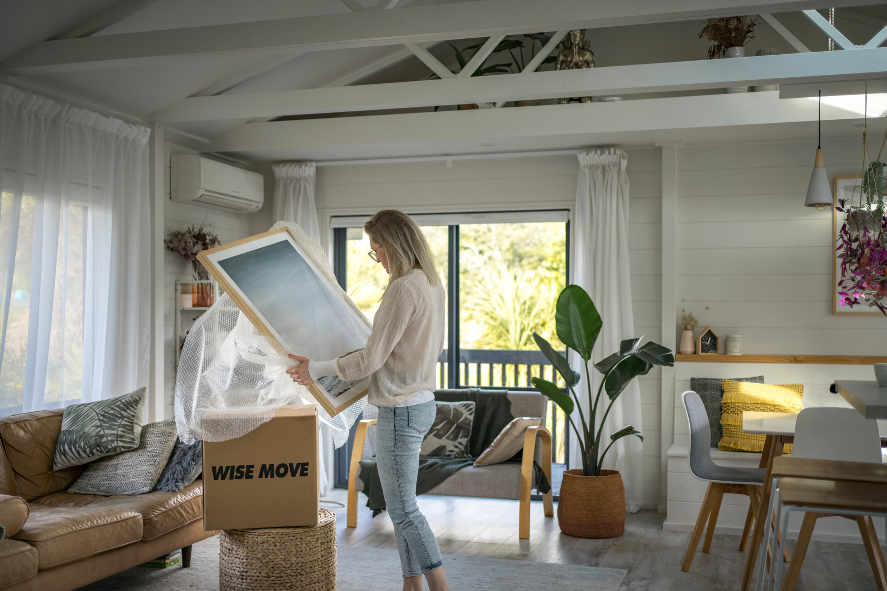 woman decluttering room