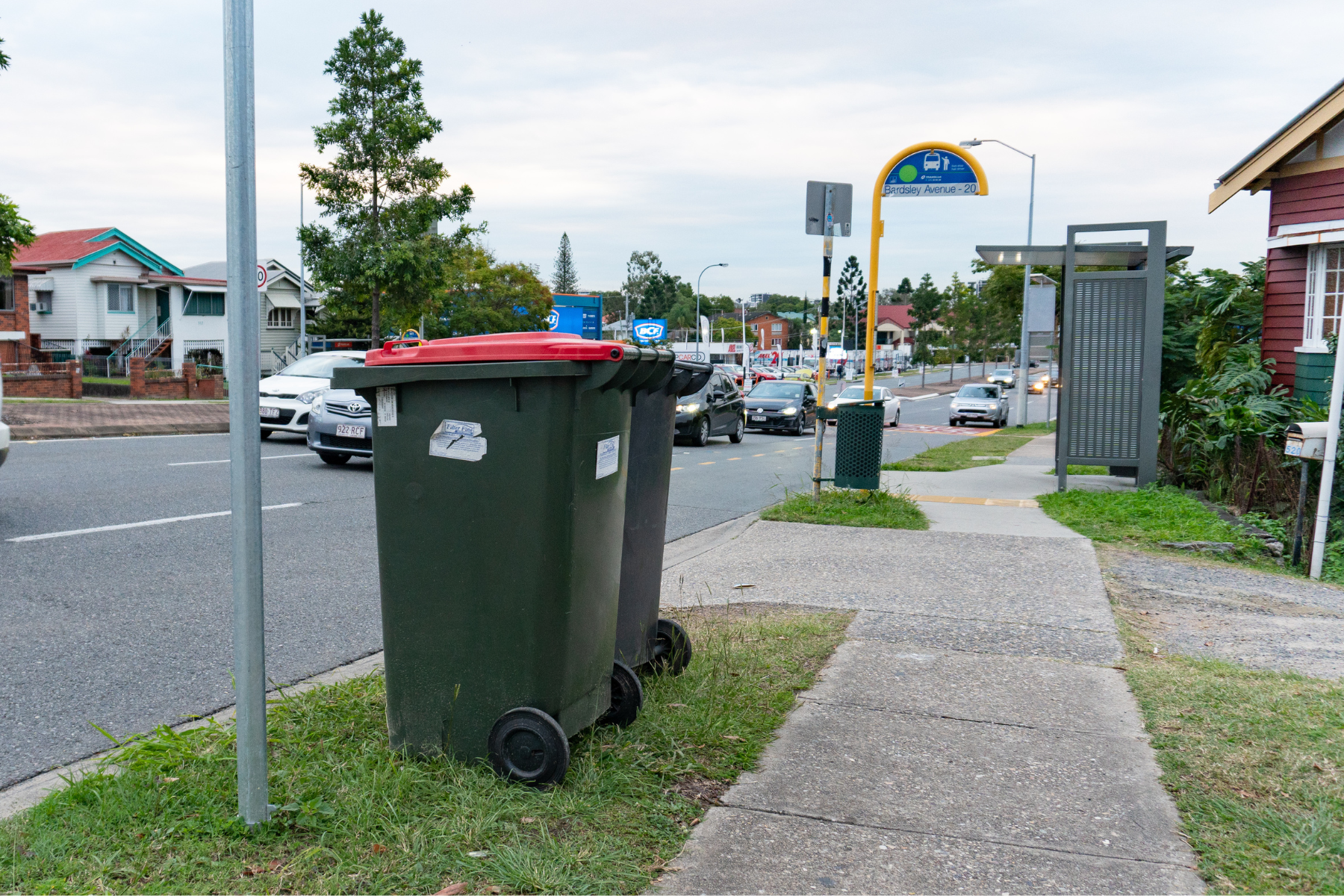 2 garbage bins outside on the kerb in Brisbane, Australia