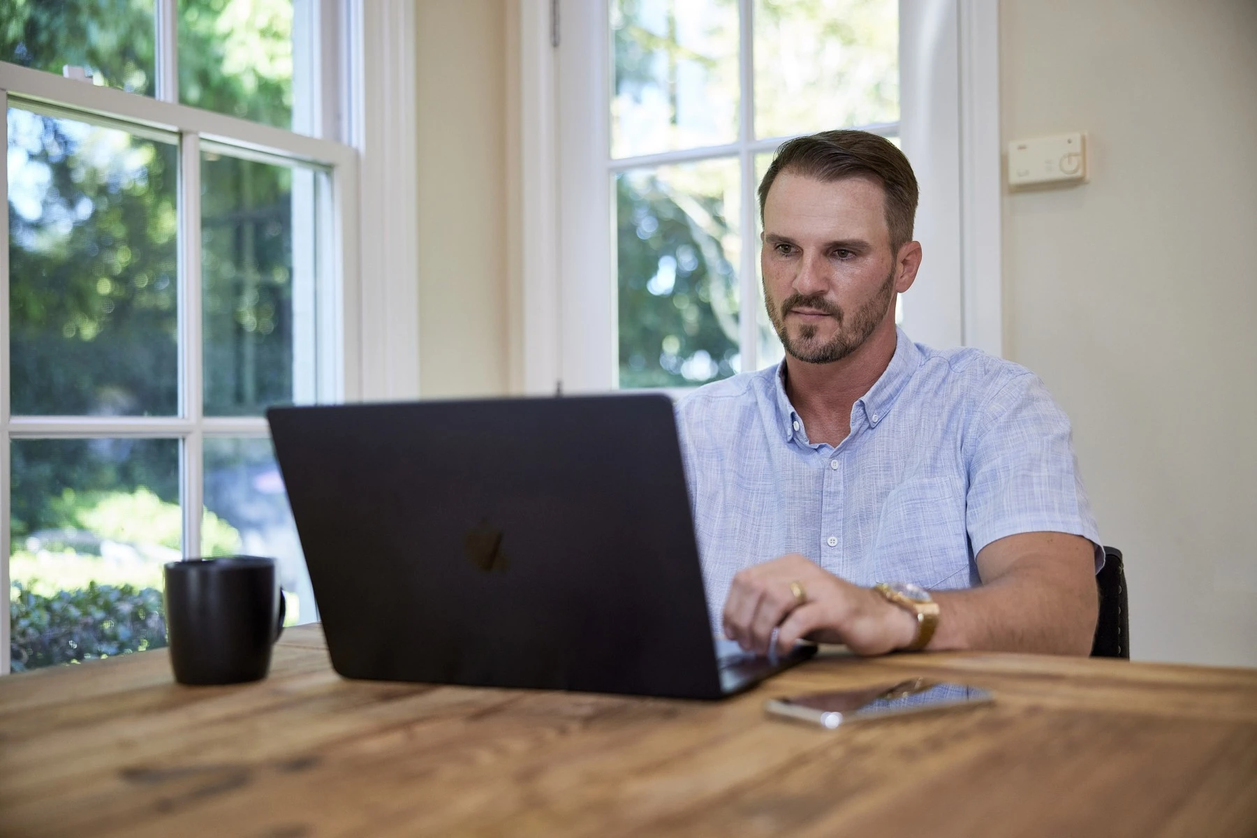 Project manager on call discussing office relocation