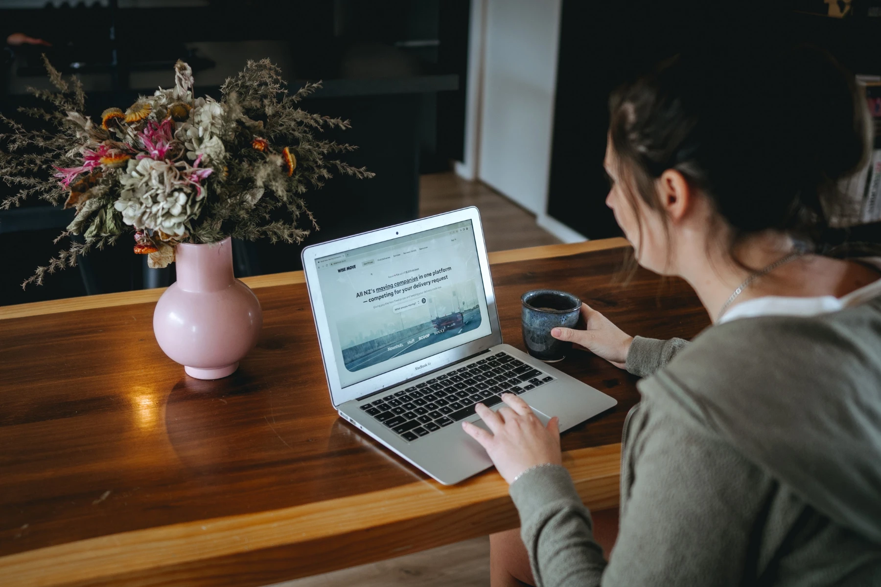 woman looking at removalist website