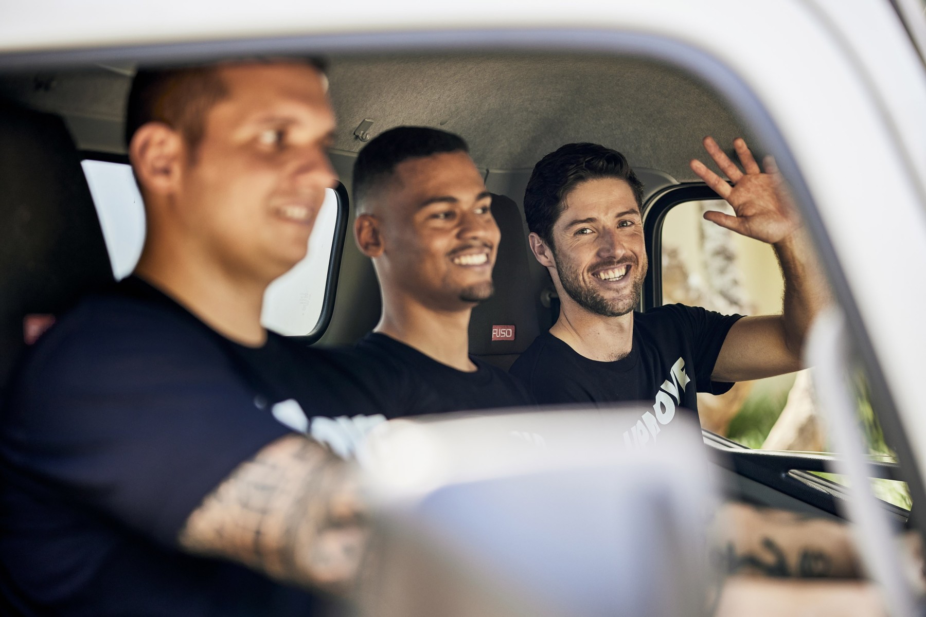 Professional movers in truck ready for a safe home move.