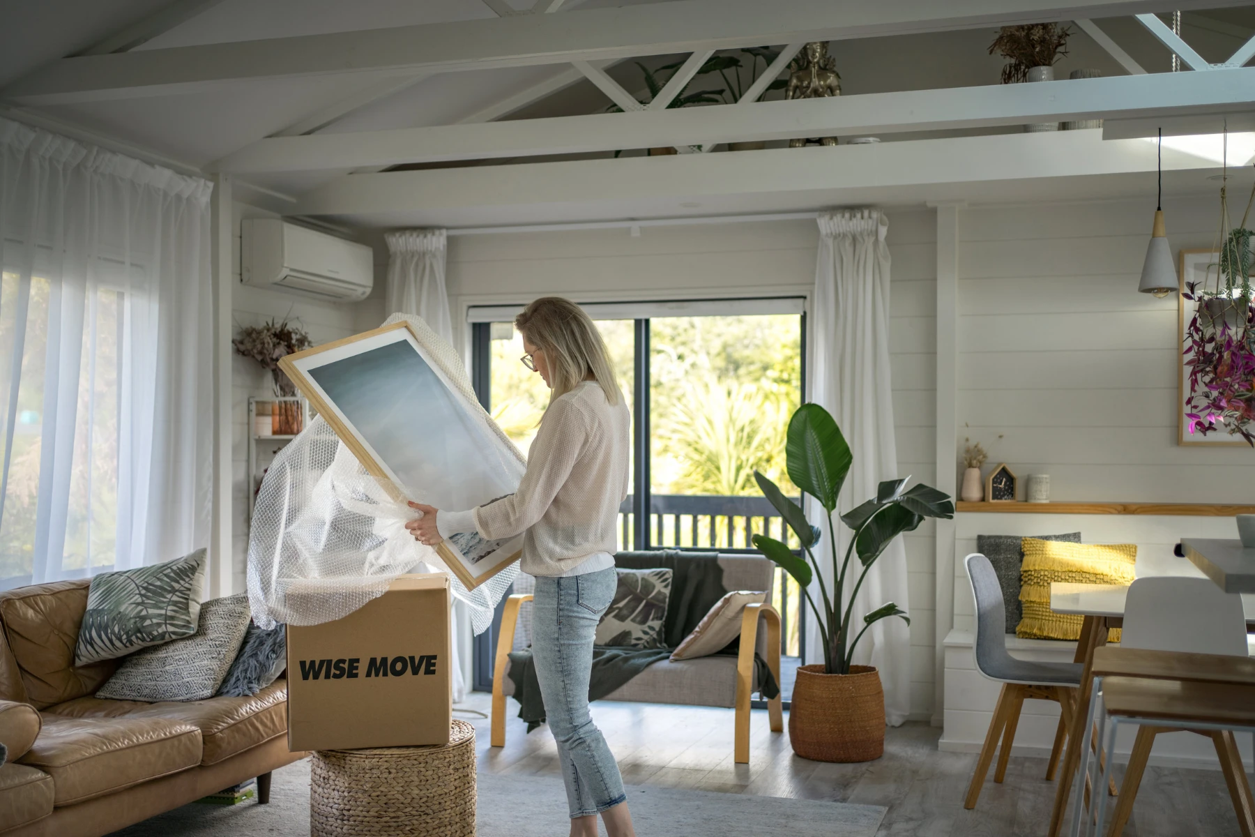 woman decluttering room
