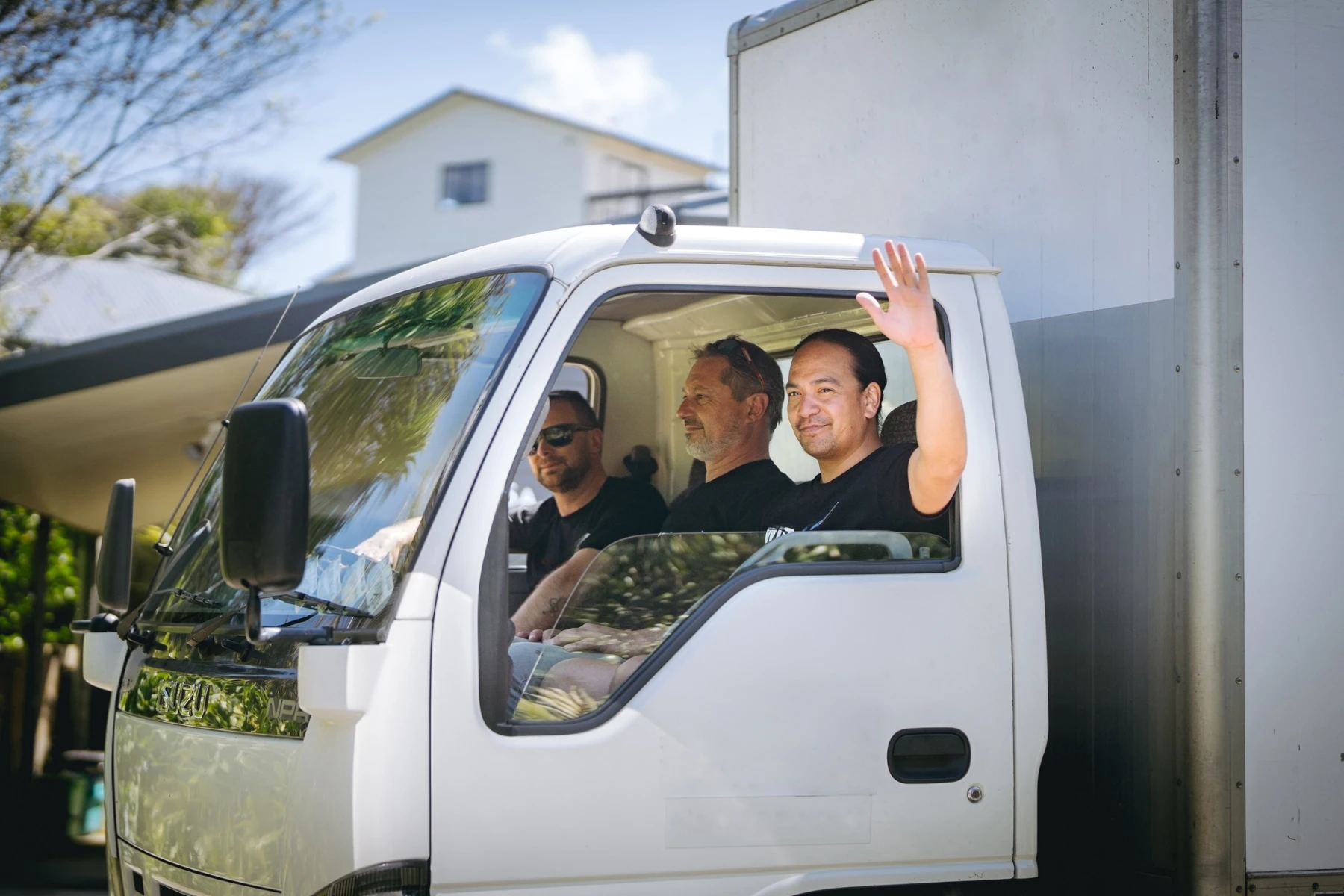 three removalists in truck