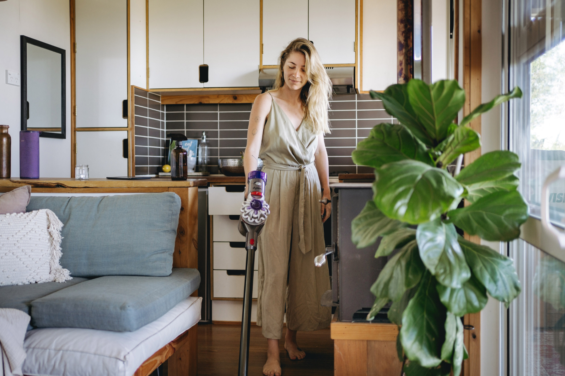 woman with vacuuming floor