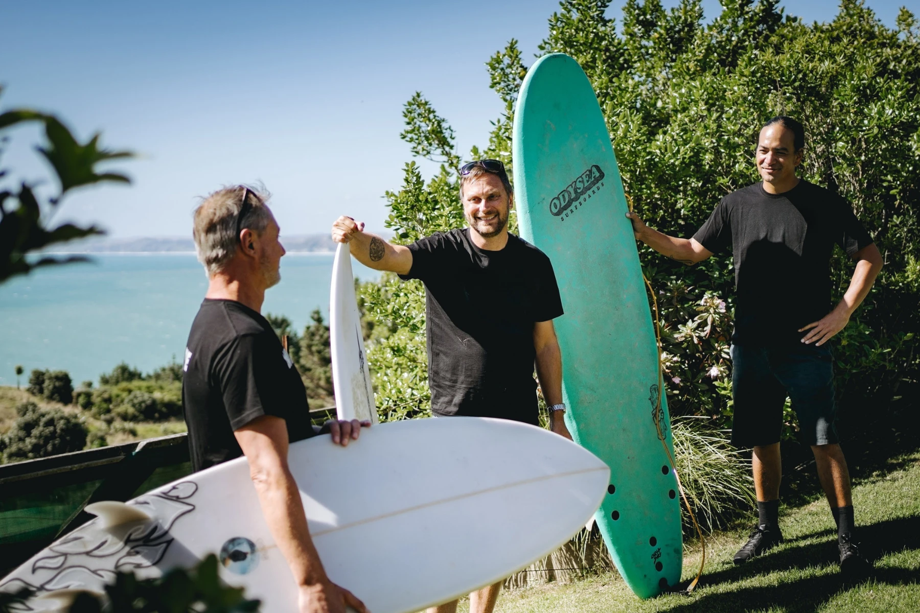 3 removalists with surfboards