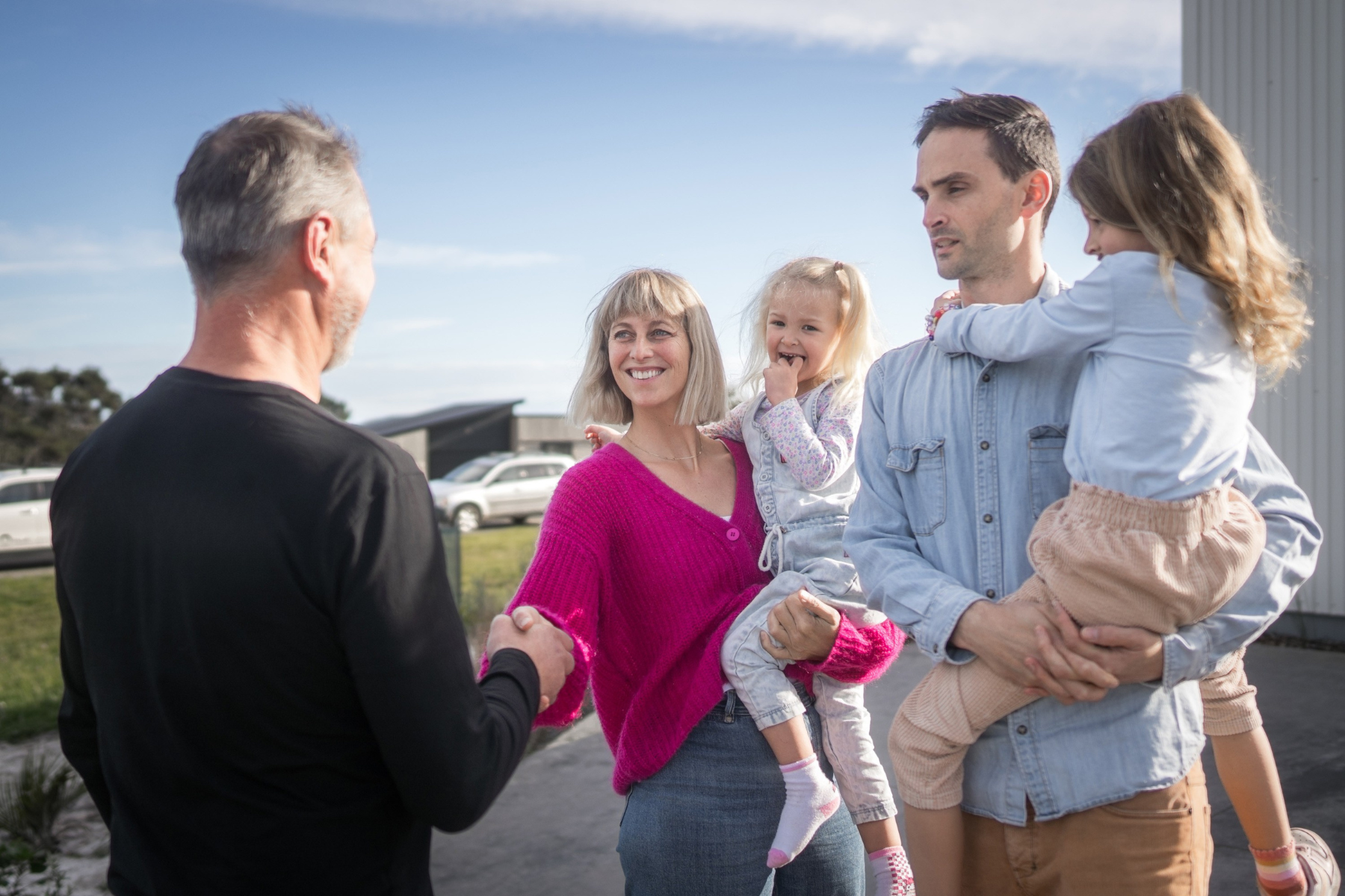 couple with children meeting removalist